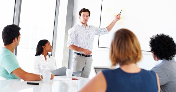 Man presenting to coworkers